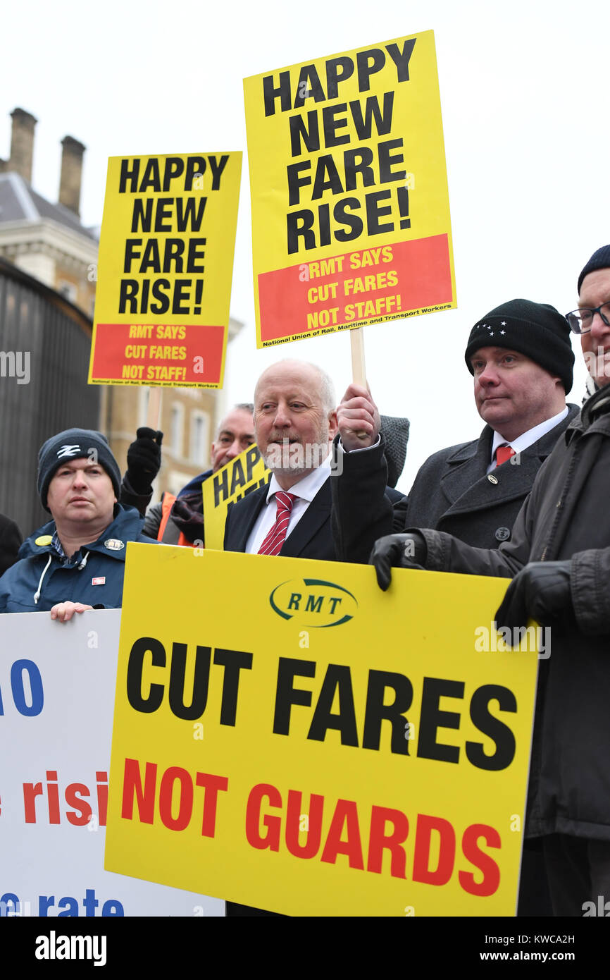 Campaigners protest against rail fare increases outside King's Cross station in London. Stock Photo