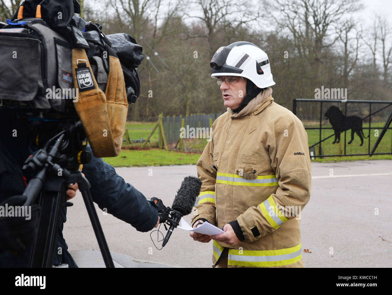 Fire Station Commander at Kempston Paul Goddard speaks to the media outside Woburn Safari Park in Bedfordshire where 13 Patas monkeys have died in a fire Stock Photo