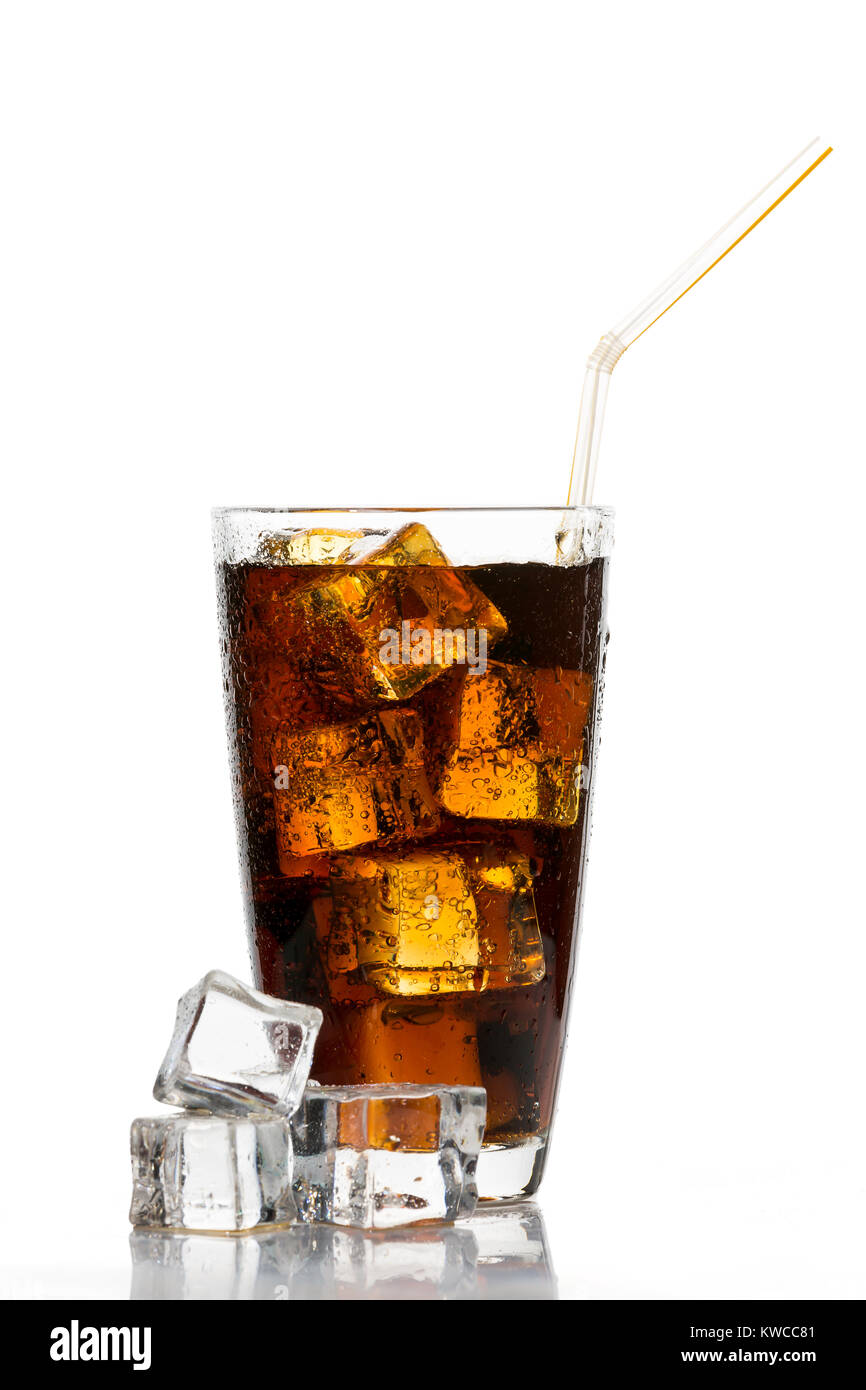 Wet glass of cola with ice cubes and straw isolated on white background
