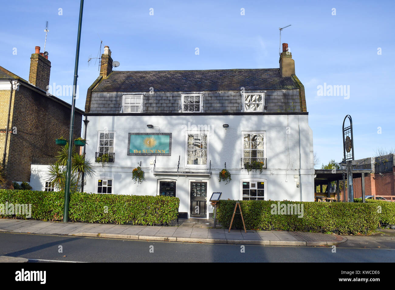 The Sun Inn overlooking the pond at Barnes South West London UK Stock Photo