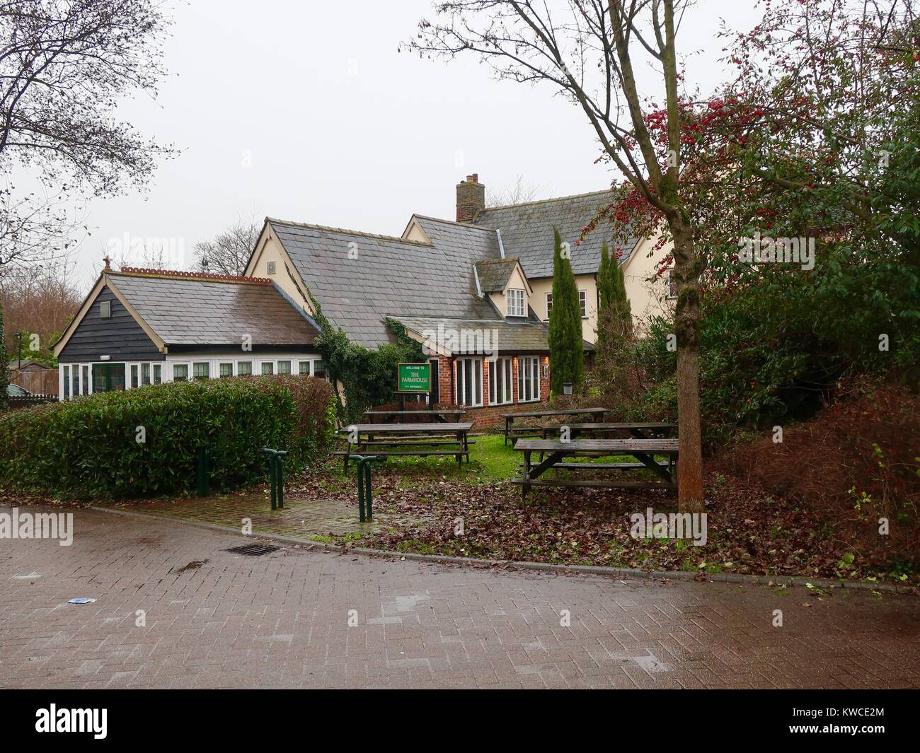 The Hungry Horse Farmhouse pub on a wet, rainy, overcast day. Grange