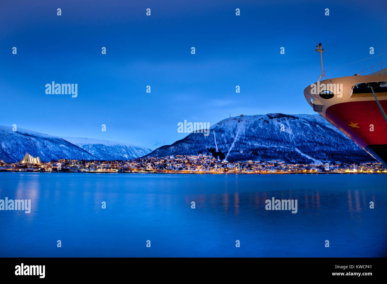 Tromso, Norway, view across the water at dusk Stock Photo