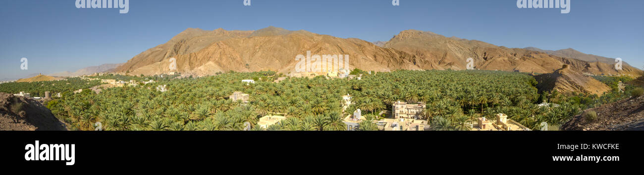 Oasis Panorama Omani Mountains at Jabal Akhdar in Al Hajar Mountains, Oman at sunset. This place is 2000 meters above sea level. Stock Photo