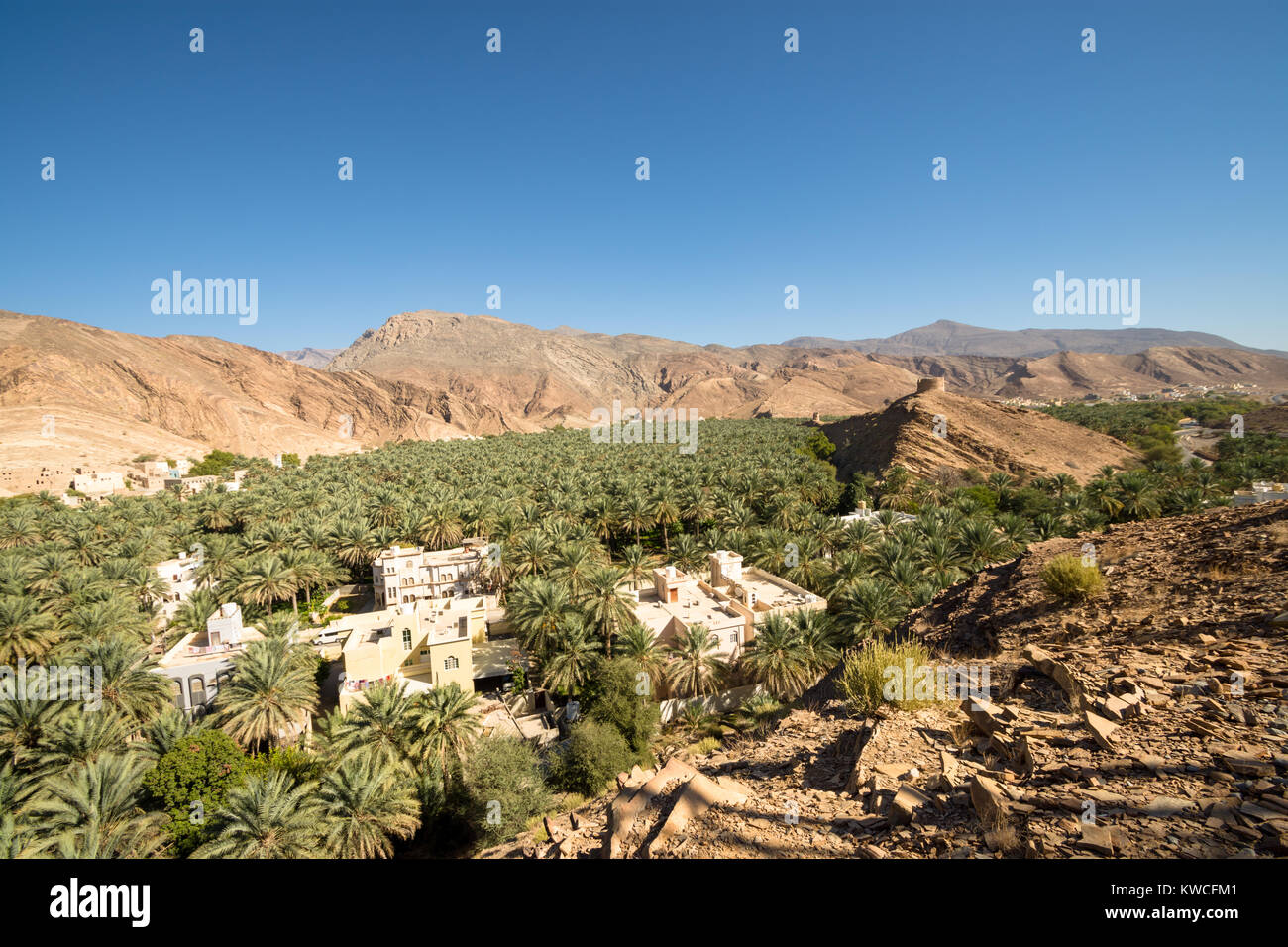 Oasis Panorama Omani Mountains at Jabal Akhdar in Al Hajar Mountains, Oman at sunset. This place is 2000 meters above sea level. Stock Photo