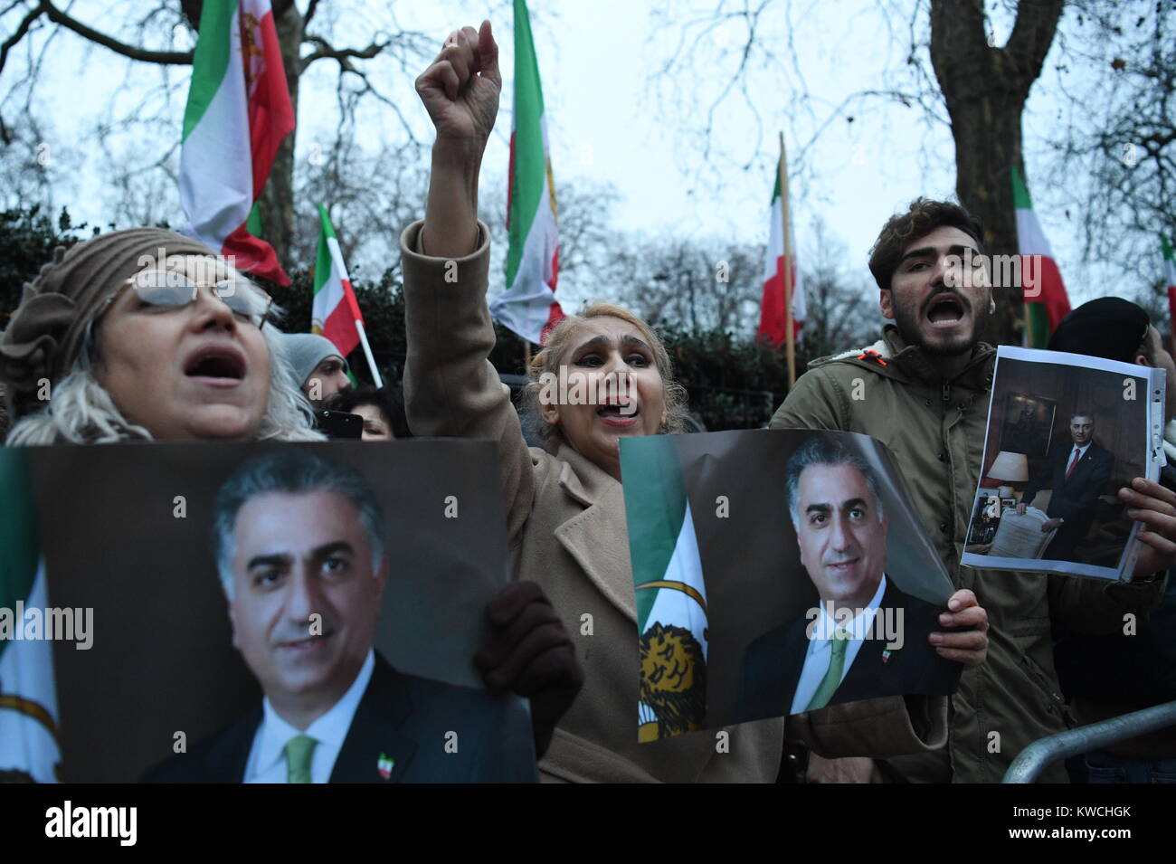Supporters of the People's Mojahedin Organisation, Iran's main opposition, rallying outside the Iranian regime's embassy, London, in solidarity with Iranian people's protests nationwide. Stock Photo