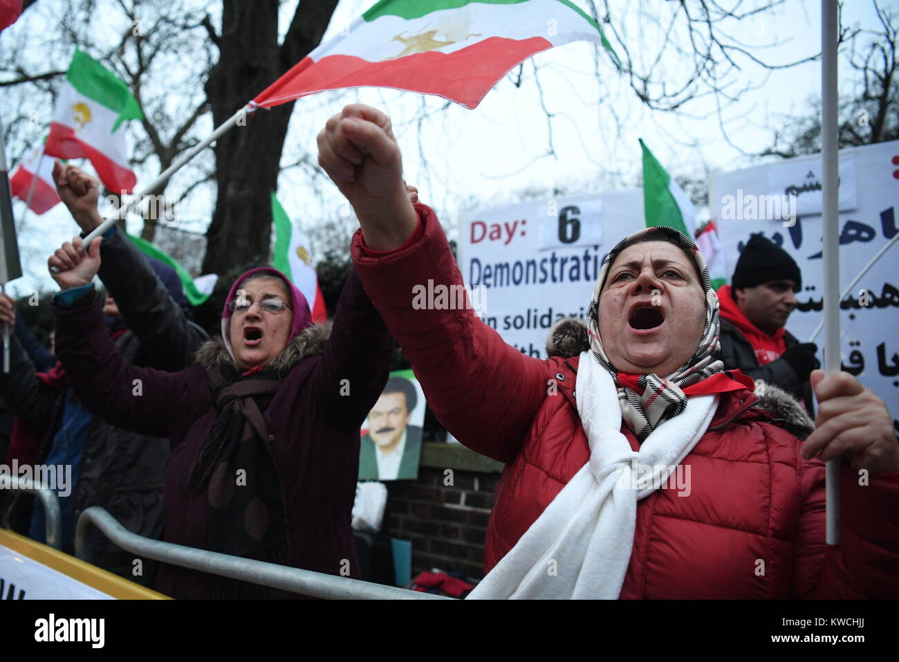 Supporters of the People's Mojahedin Organisation, Iran's main opposition, rallying outside the Iranian regime's embassy, London, in solidarity with Iranian people's protests nationwide. Stock Photo