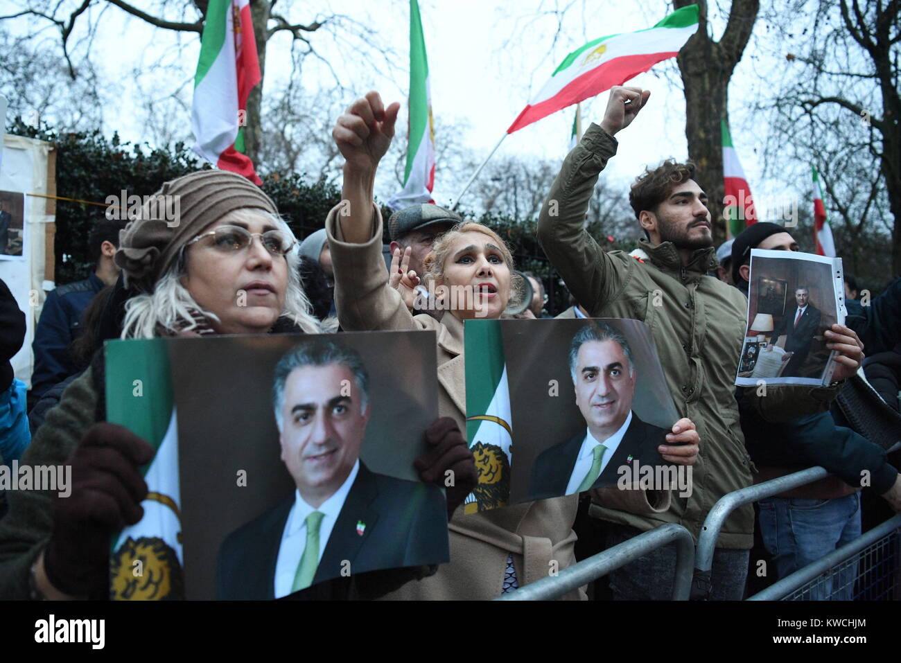 Supporters of the People's Mojahedin Organisation, Iran's main opposition, rallying outside the Iranian regime's embassy, London, in solidarity with Iranian people's protests nationwide. Stock Photo