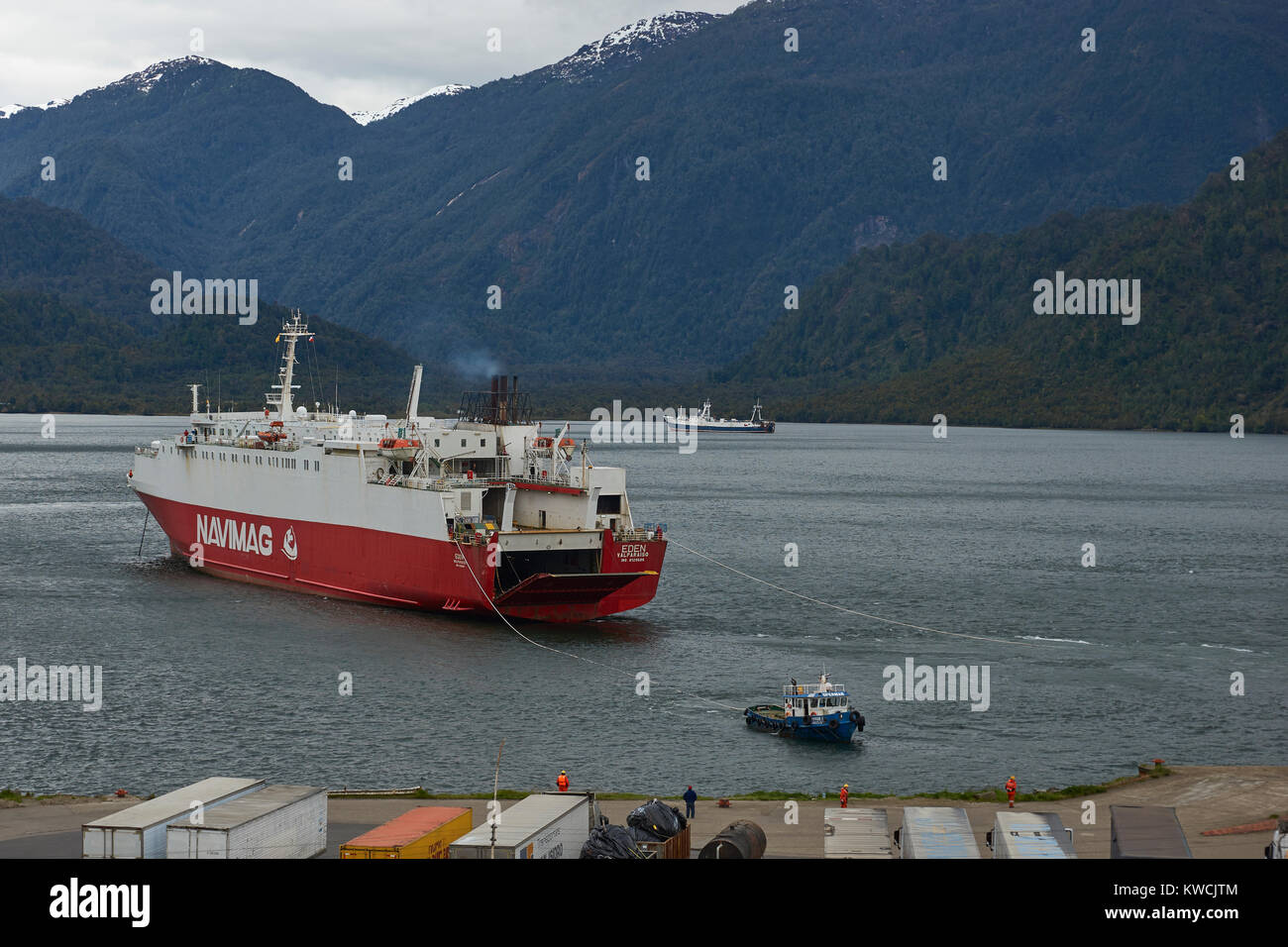 Ferry coming alongside at the coastal town of Puerto Chacabuco in northern Patagonia, Chile Stock Photo