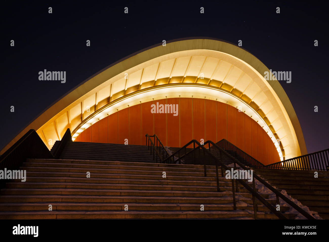 The House of World Cultures, also known as 'Schwangere Auster' (Pregnant Oyster) in Berlin at night. Stock Photo