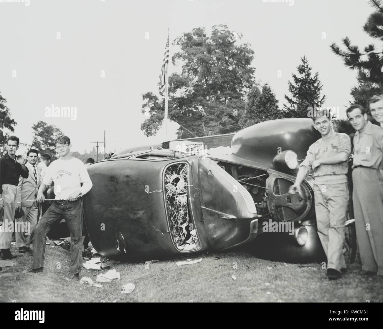 Rioters overturn and smash a car on the Paul Robeson concert grounds near Peekskill, N.Y. Sept. 4, 1949. The concert benefited the Civil Rights Congress. (BSLOC 2014 13 69) Stock Photo