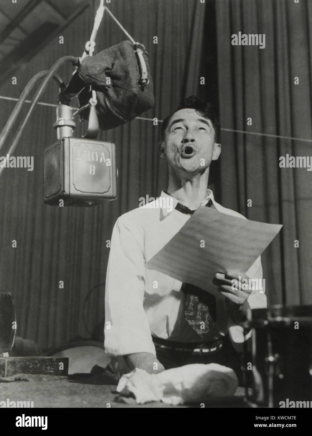 Pinto Colvig in Walt Disney studios creating sounds for an animated film in the 1930s. The American vaudeville actor became a movie voice actor who worked with the major Hollywood studios. He created the voice of Disney's 'Goofy', and voiced 'Grumpy' in SNOW WHITE AND THE SEVEN DWARFS. - (BSLOC 2014 14 3) Stock Photo