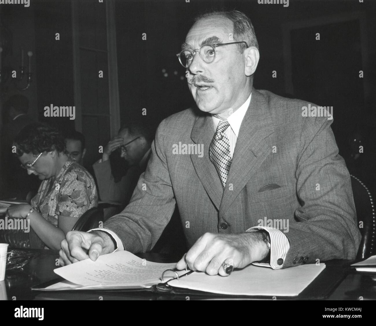 Dean Acheson, Sec. of State, testifying before the House Foreign Affairs Committee. He was supporting a second Mutual Defense Assistance Program before the house Foreign Affairs Committee. June 5, 1950. - (BSLOC_2014_15_108) Stock Photo
