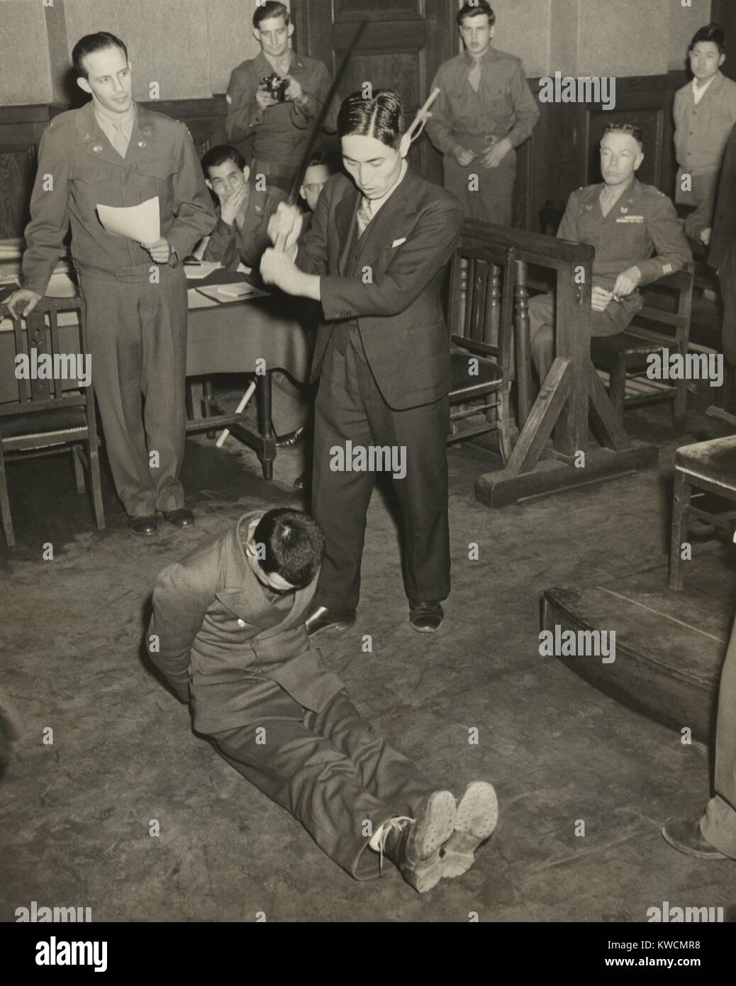 Reenactment of the beheading of Lt. Darwin Emry during war crimes trial in Yokohama, Japan. Emry was one of seven survivors of a B-29 shot down over Japan on May 25, 1945. (BSLOC 2014 13 9) Stock Photo
