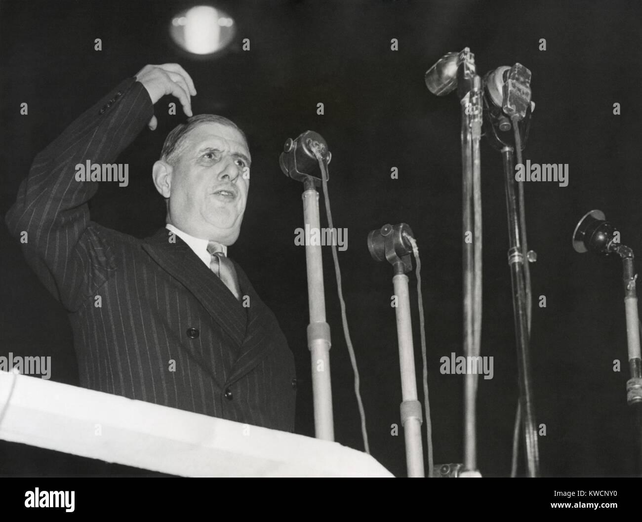 Charles De Gaulle speaking, ca. 1947-50. From April 1947 to May 1953, De Gaulle attempted to achieve national leadership through his French People's Party. He finally became Prime Minister in June 1958. - (BSLOC_2014_15_238) Stock Photo