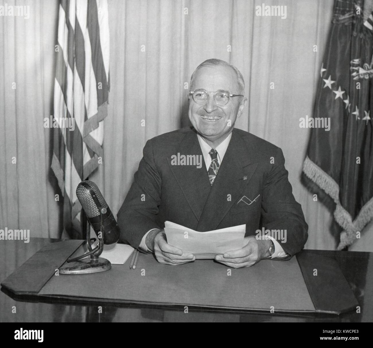 President Harry Truman delivering a radio speech on Jan. 2, 1946. He addressed the program for the return to peacetime economy. - (BSLOC 2014 15 9) Stock Photo