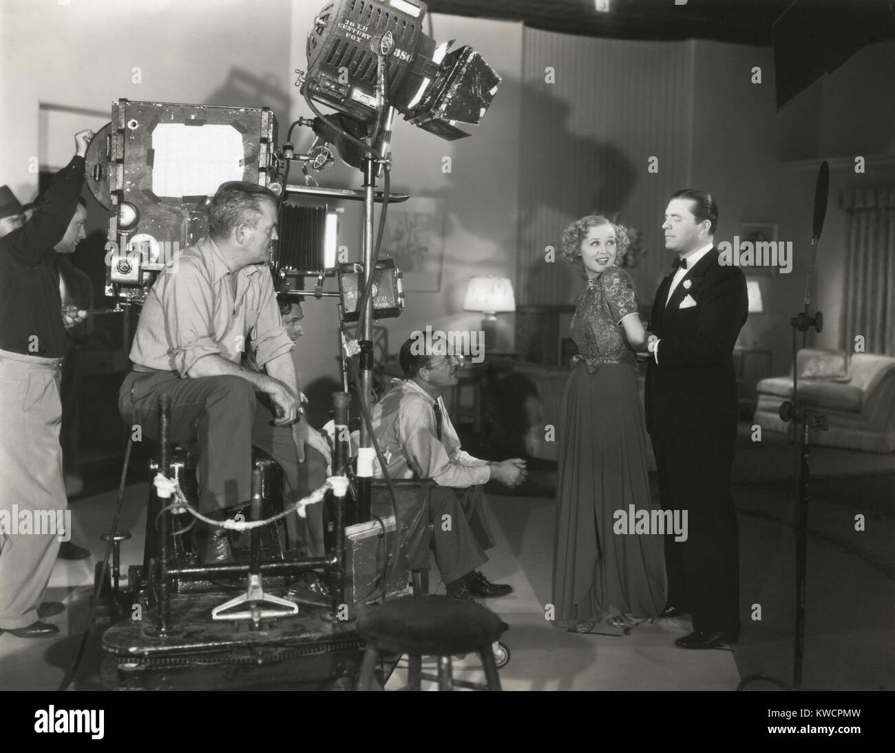 Camera man Don Clark and Director James Tinling film a scene for 'Change of Heart' with Lyle Talbot and Gloria Stuart. 20th Century Fox. Ca. 1938. - (BSLOC 2014 17 123) Stock Photo
