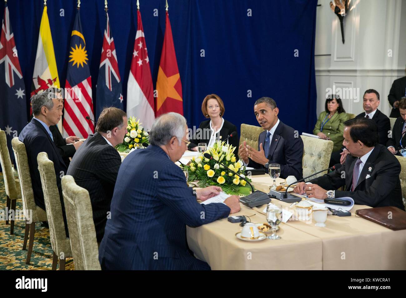 President Barack Obama at the ASEAN Summit at Peace Palace in Phnom Penh, Cambodia, Nov. 20, 2012. Taking part in the meeting, clockwise from the President, are: Sultan of Brunei Hassanal Bolkiah; PM Mohammed Najib Abdul Razak of Malaysia; PM John Key of New Zealand; PM Lee Hsien Loong of Singapore; PM Nguyen Tan Dung of Vietnam; and PM Julia Gillard of Australia. (BSLOC 2015 3 142) Stock Photo