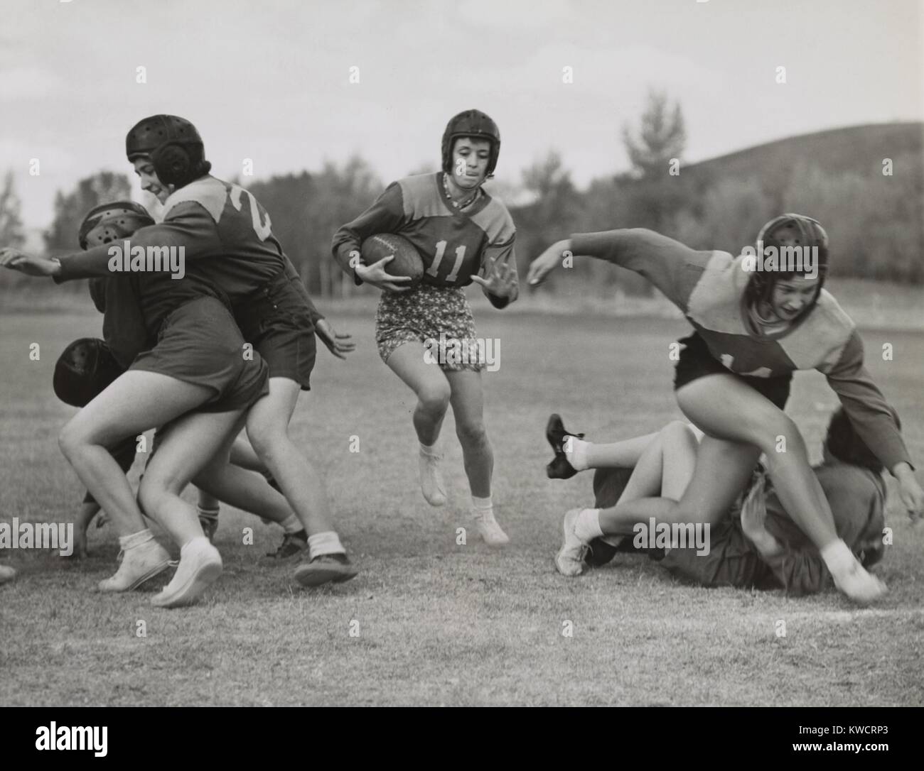 Coeds from Western State College staged their annual Powder Bowl football game. Oct. 14, 1939. Gunnison, Colorado. - (BSLOC 2015 1 221) Stock Photo