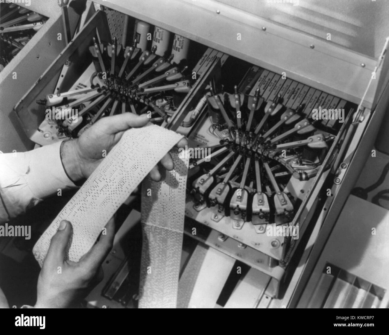 Tape-punching equipment for the automatic message accounting system at Bell Telephone laboratories. 1949. - (BSLOC 2015 1 225) Stock Photo