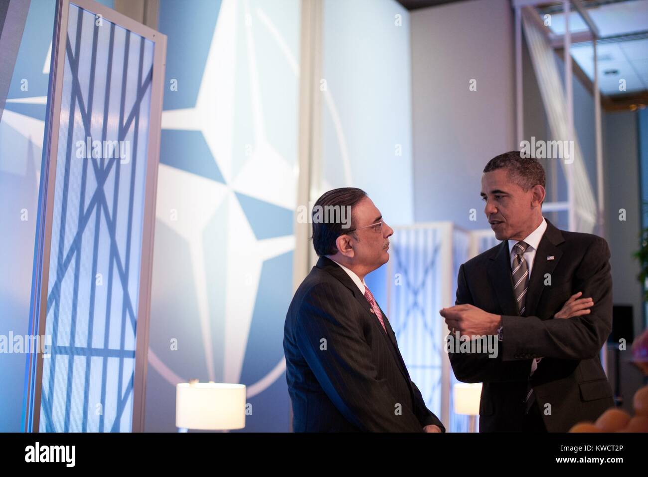 Barack Obama talks with President Asif Ali Zardari of Pakistan before a meeting on Afghanistan. They were attending a NATO Summit in Chicago, Ill., May 21, 2012. (BSLOC 2015 3 191) Stock Photo