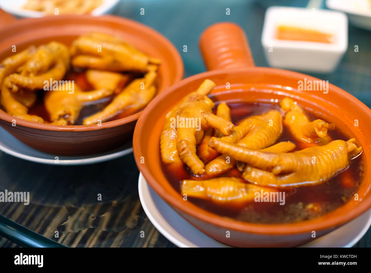 Chinese dim sum Abalone sauce chicken feet Stock Photo Alamy