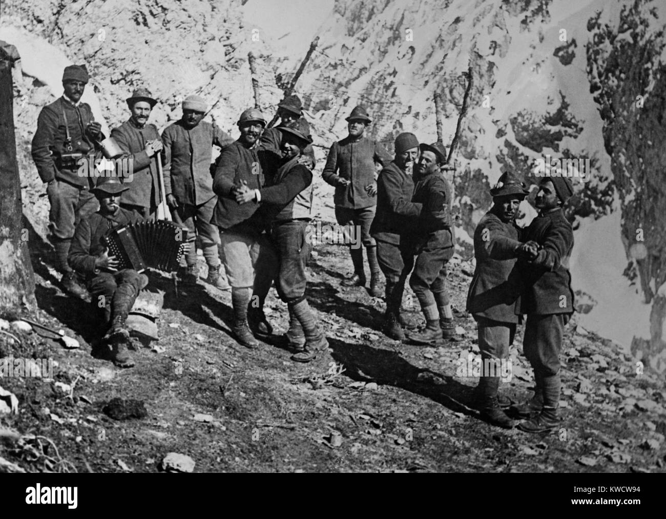 World War 1 in the Italian and Austria Alps. Italian soldiers at mountain outpost dance in pairs, accompanied by an accordion. Ca. 1915-17. (BSLOC 2013 1 26) Stock Photo