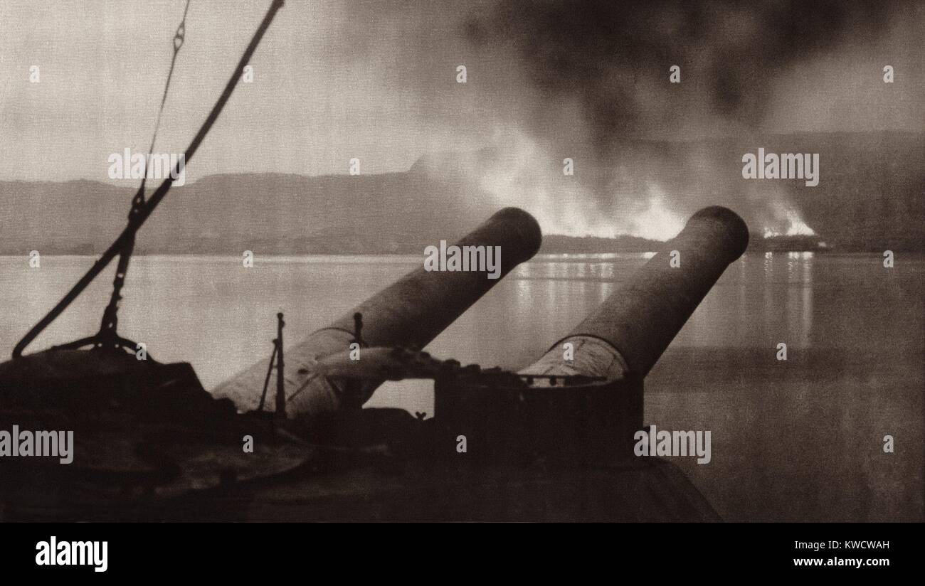 World War 1. The British and French abandoned their Dardanelles campaign in Jan. 1916 and burning all stores and equipment that could not be removed. Fires on the shores of Suvla Bay are seen from the Deck of the H.M.S. Cornwallis, the British last ship to leave the Dardanelles. (BSLOC 2013 1 48) Stock Photo