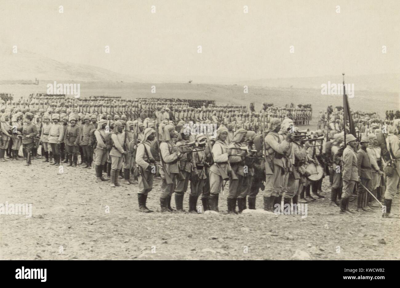 World War 1 in the Middle East. Turkish and Arab troops, the Suez Expeditionary Force of 25,000, muster on the Plain of Esdraelon. The Ottoman Fourth Army, commanded by General Ahmed Cemal (Far Left, with cane), engaged British Empire troops at Suez on Feb. 2-3, 1915,and suffered 2,000 casualties (to the British 150) before they retreated back to Beersheba, Palestine. (BSLOC_2013_1_53) Stock Photo