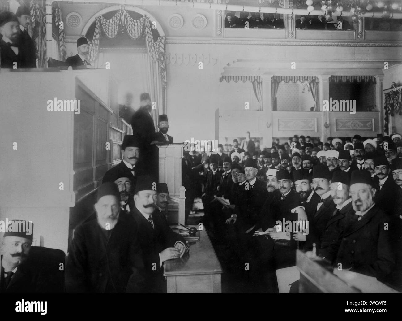 Turkish Parliament in session, near the end of the short Second Constitutional Era, 1908-1912. After the 1913 coup détat by the Young Turks dictatorship, the Parliament and the Sultan lost all meaningful political authority. The Three Pashas: Enver P (BSLOC 2017 1 107) Stock Photo