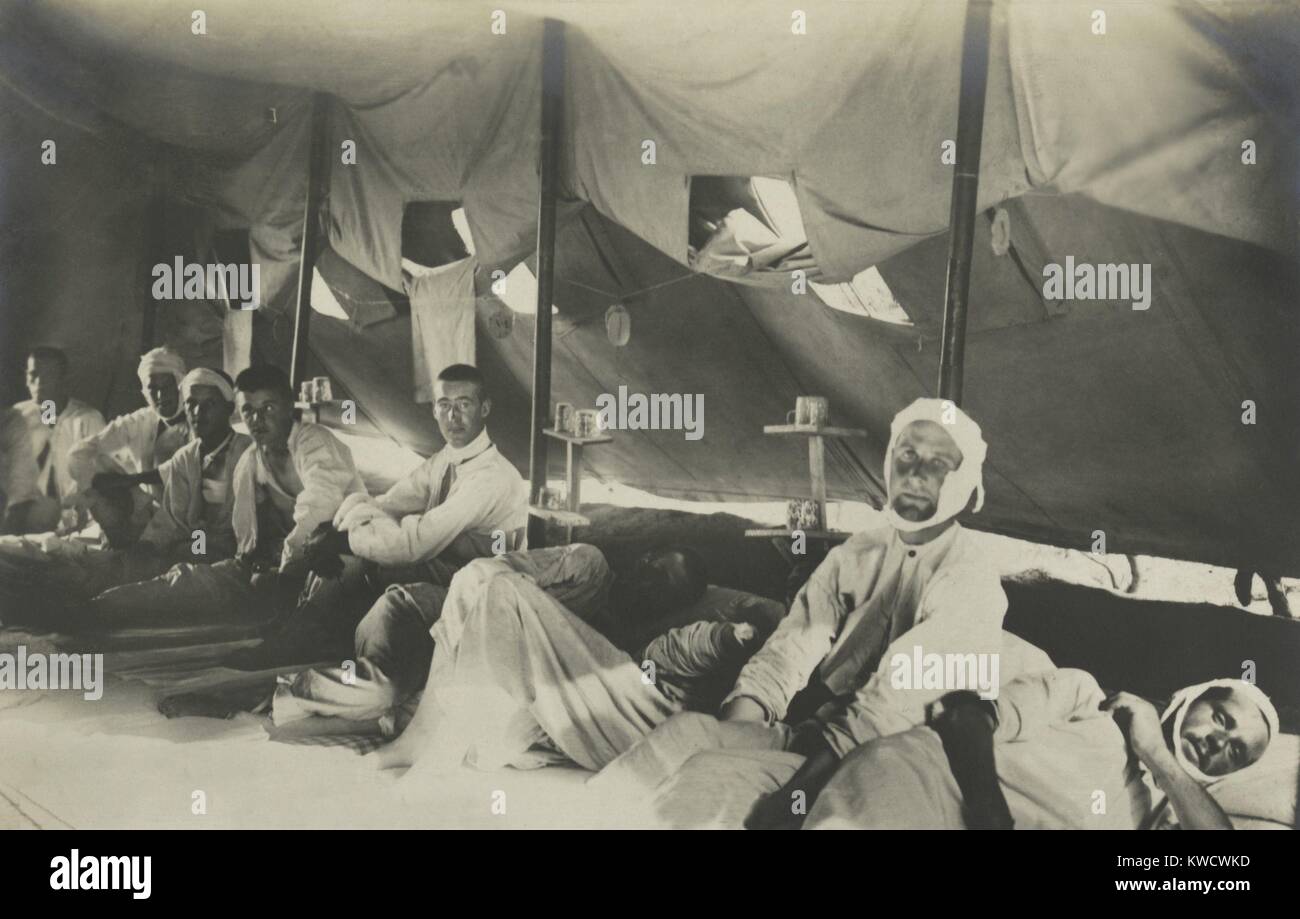 British POWs of the Dardanelles campaign in Turkish custody. Some are bandaged, as they occupy sleeping quarters in a tent. 1915-1916, during WW1 (BSLOC 2017 1 154) Stock Photo