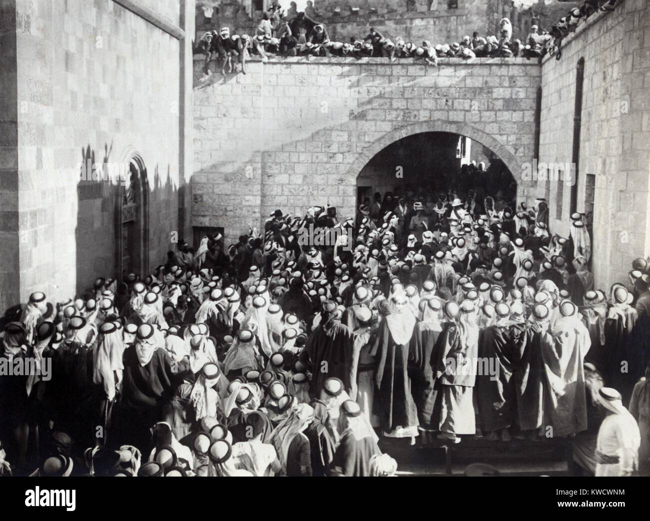 British official reading Sir Herbert Samuels proclamation supporting Abdullah I bin al-Hussein. Jerusalem, July 7, 1920. Abdullah soon became the Emir of the British Mandate of Trans-Jordan, and in 1946 he was the King of the independent nation of Jordan (BSLOC 2017 1 180) Stock Photo