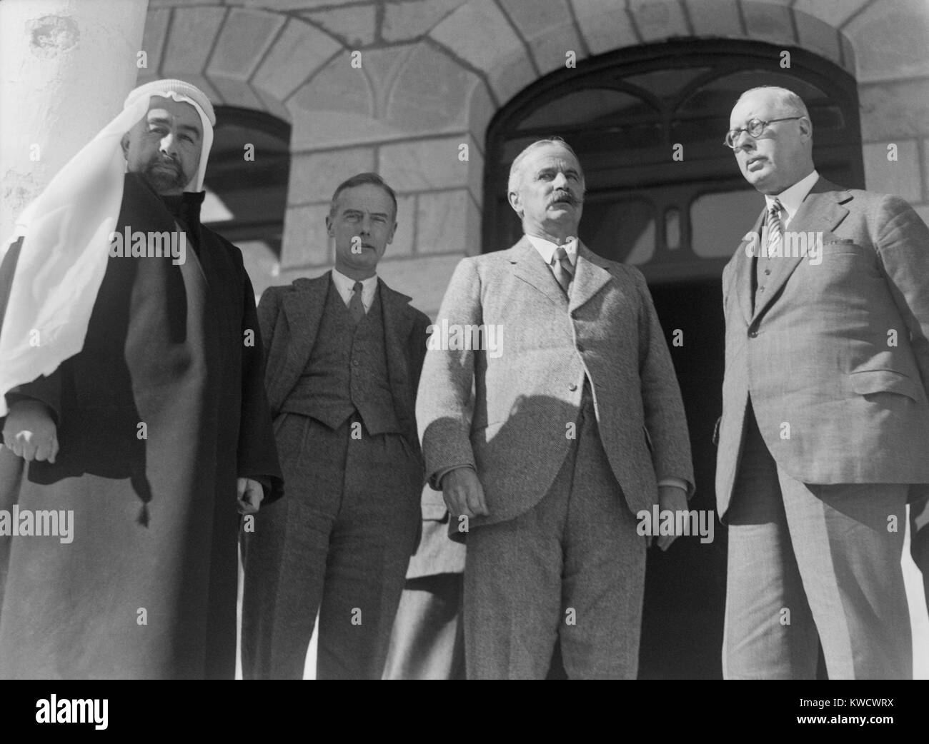 Emir Abdullah, leader of British Mandatory Jordan receives Members of the Peel Commission. On Jan. 11, 1937, they conferenced with him on their conclusion that Palestine be partitioned into Jewish and Arab zones. The proposed Arab zone bordered on Jordan (BSLOC 2017 1 205) Stock Photo