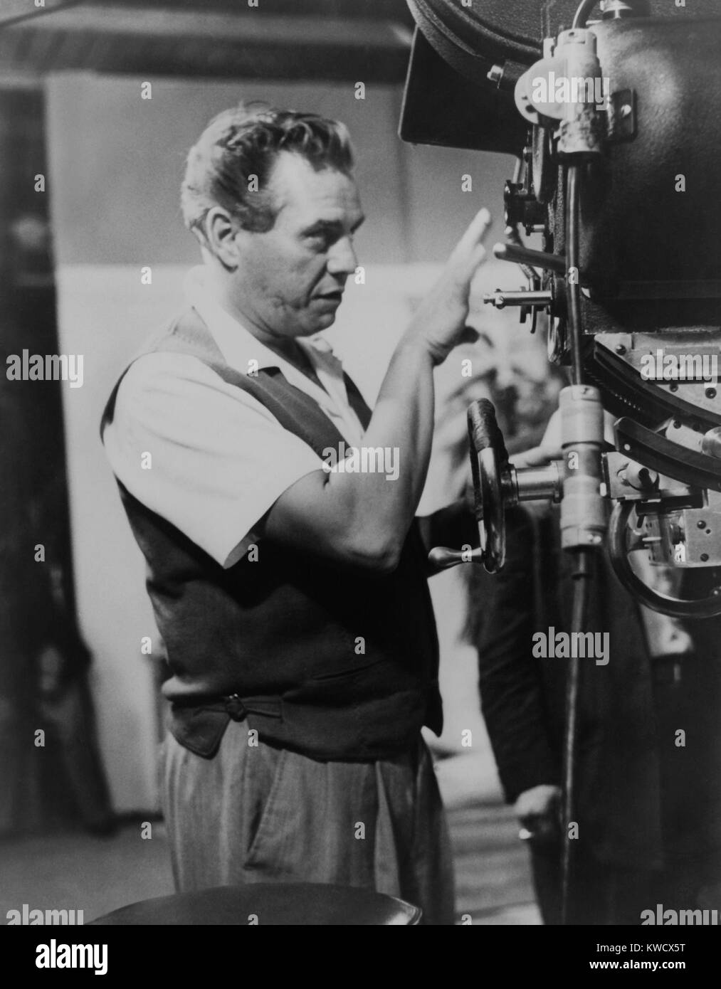Desi Arnaz at a camera as executive producer of I LOVE LUCY TV series from 1952-57. Desilu Productions filmed the live performances with multiple sets and camera. Arnaz negotiated ownership and control of all rights to the film (BSLOC 2017 2 192) Stock Photo
