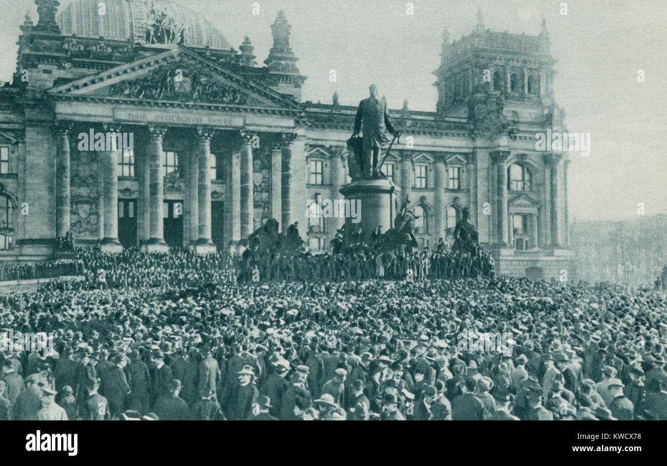 Crowd at the Reichstag Building, Berlin, at the proclamation of new government Nov. 10, 1918. Kaiser Wilhelm II abdicated on the same day, in the aftermath of Germanys defeat in World War 1 (BSLOC 2017 2 50) Stock Photo