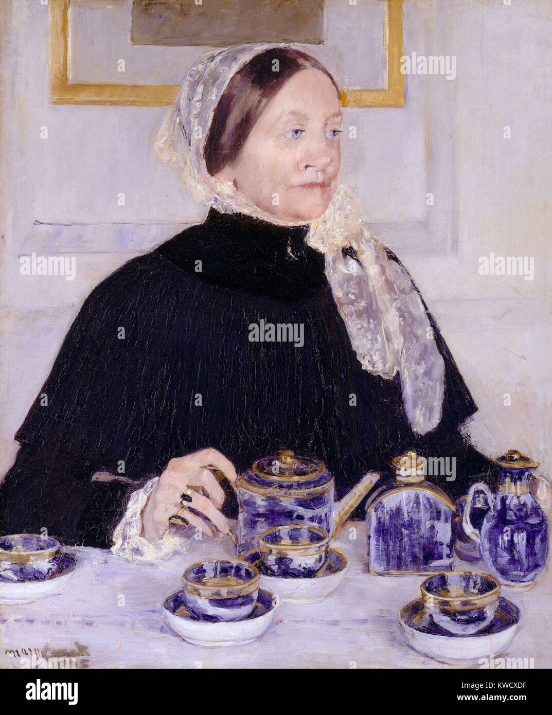 Lady at the Tea Table, by Mary Cassatt, 1883-85, French impressionist painting, oil on canvas. Mary Dickinson Riddle, a Cassatt family cousin, painted with a gilded blue-and-white Canton porcelain service, she gave to her Cassatt relatives. Mary painted this portrait in response to the gift, but the Riddle family didnt like the painting and it remained in the artists collection (BSLOC 2017 3 145) Stock Photo