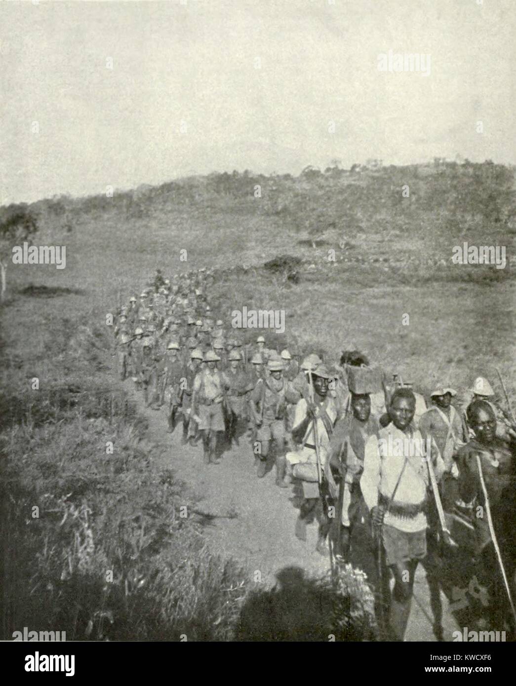 World War 1 in East Africa. British and Empire African soldiers on the march in 1917. They captured 2000 German colonial regulars and Askaris (African troops) and pushed the rest of General Von Lettows forces across the border into Portuguese Nyasaland. (BSLOC 2013 1 46) Stock Photo