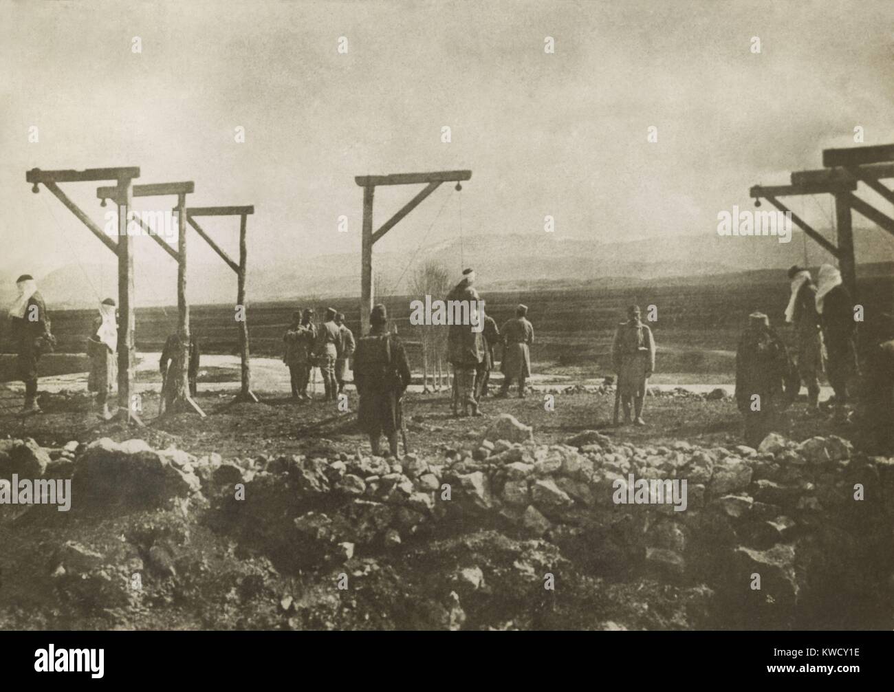 Austrian soldiers executing Serbian civilians by hanging during World War 1. Habsburg military courts issued death sentences on a mass scale to ‘spies’ and ‘traitors’ (BSLOC 2017 1 177) Stock Photo