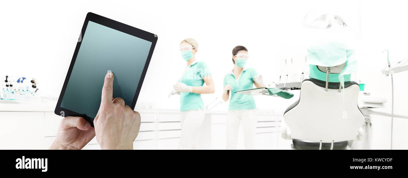 Dentist Hand Touch Digital Tablet Screen On Dental Clinic With