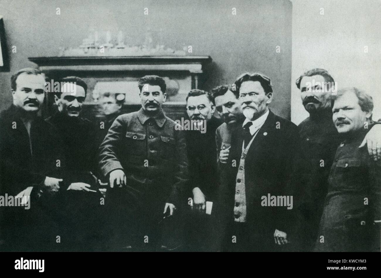 Stalin photographed with high Soviet officials, in March 1929. L-R: Vyacheslav Molotov, Anastas Mikoyan, Josef Stalin, Grigory Petrovsky, Kliment Voroshilov, Mikhail Kalinin, Alexander Smirnov, Tolokonzev. Petrovsky and Smirnov were executed during the 1930s Stalinist purges (BSLOC 2017 2 31) Stock Photo