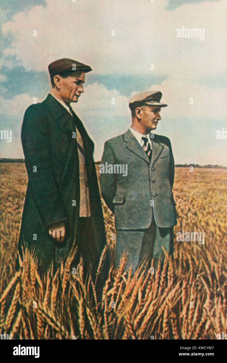 Trofim Lysenko (left), at an experimental farm Academy of Agriculture Science, 1949. As President of the Soviet Russian Academy of Agriculture Science he denied existence of genes or DNA, and promoted his pseudoscientific theory inheritance of acquired characteristics (BSLOC 2017 2 35) Stock Photo