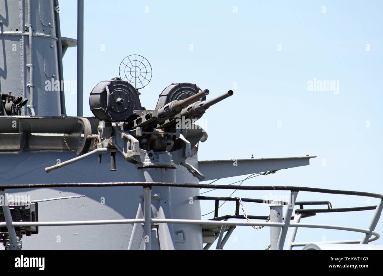 Machine gun on deck of a battleship in the harbor of San Francisco, California Stock Photo