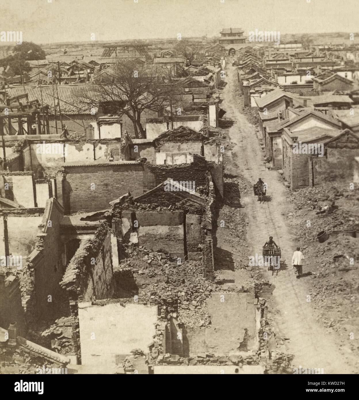 War-damaged Tianjin (Tientsin), China in July 1900 during the Box Rebellion. Its foreign quarter was besieged by the Boxers in June. On July 13-14, the eight nation allied force of 20,000 troops, took over Tianjin, as the first obstacle on their way the Beijing. Aggressive looting and massacre was committed by the Japanese and Russian soldiers, but soldiers of all nation took part  (BSLOC_2017_20_26) Stock Photo