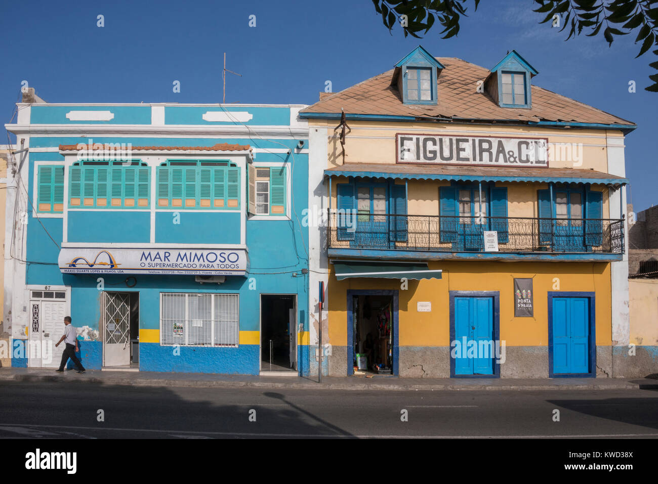Colorful facades of old colonial houses on the maritime avenue of Mindelo, on the island of San Vicente, Cape Verde Stock Photo