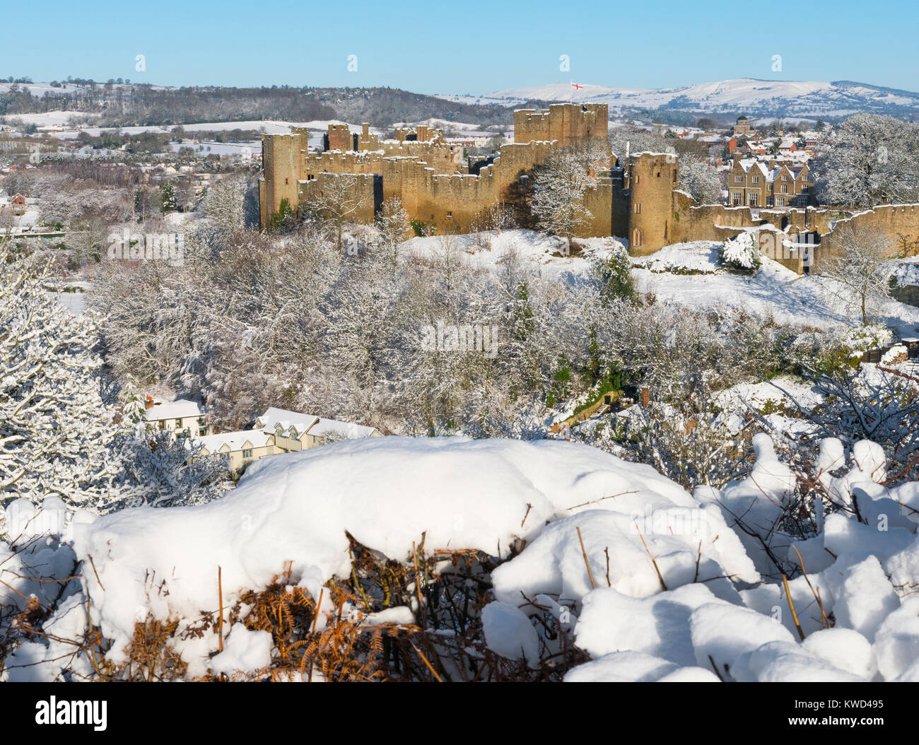 Ludlow Castle under a blanket of snow seen from Whitcliffe Common, Shropshire, England, UK Stock