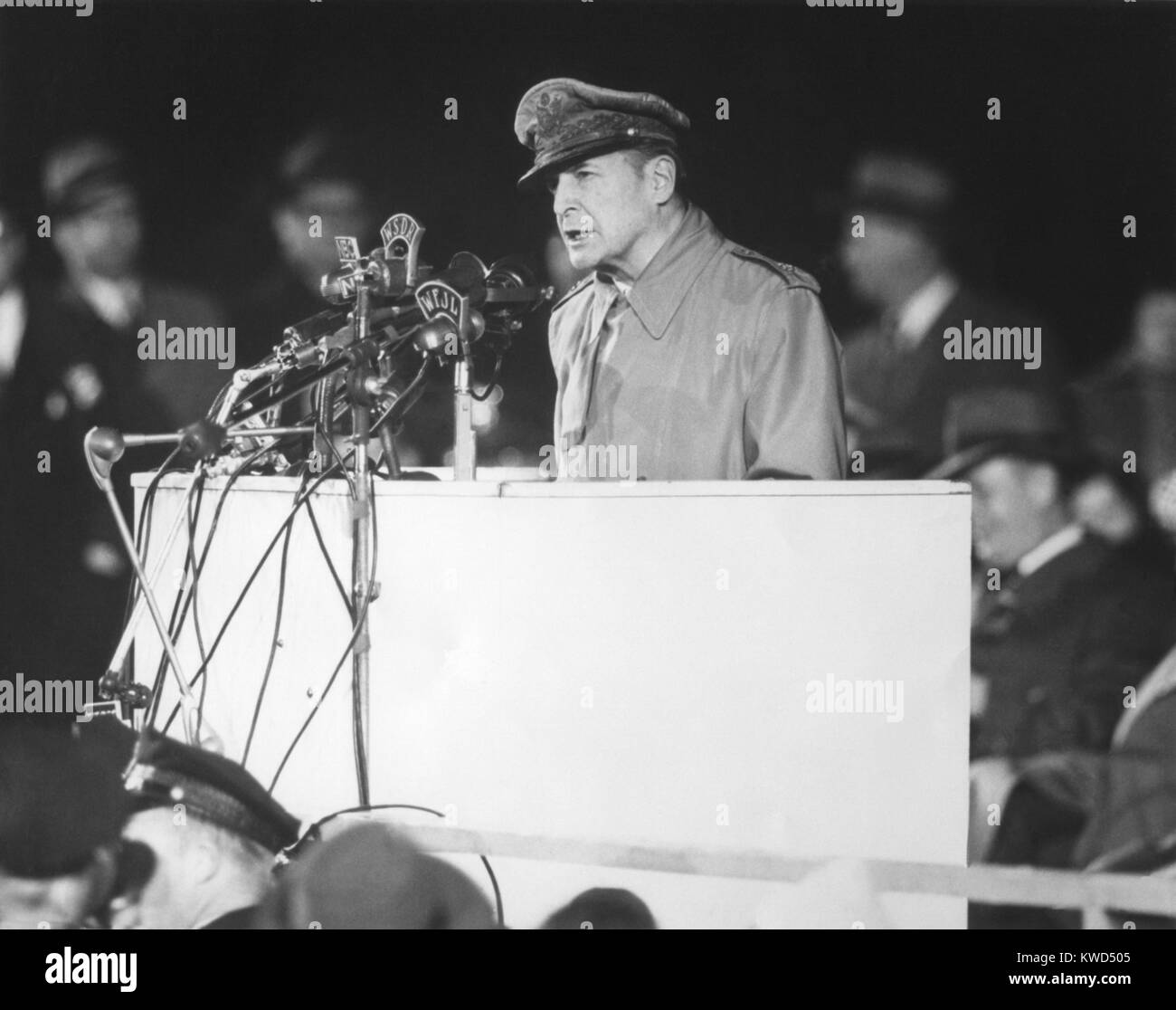 General Douglas MacArthur addressing an audience of 50,000 at Soldier's Field, Chicago on April 26, 1951. Three million people lined his parade route in Chicago. (BSLOC 2014 11 141) Stock Photo