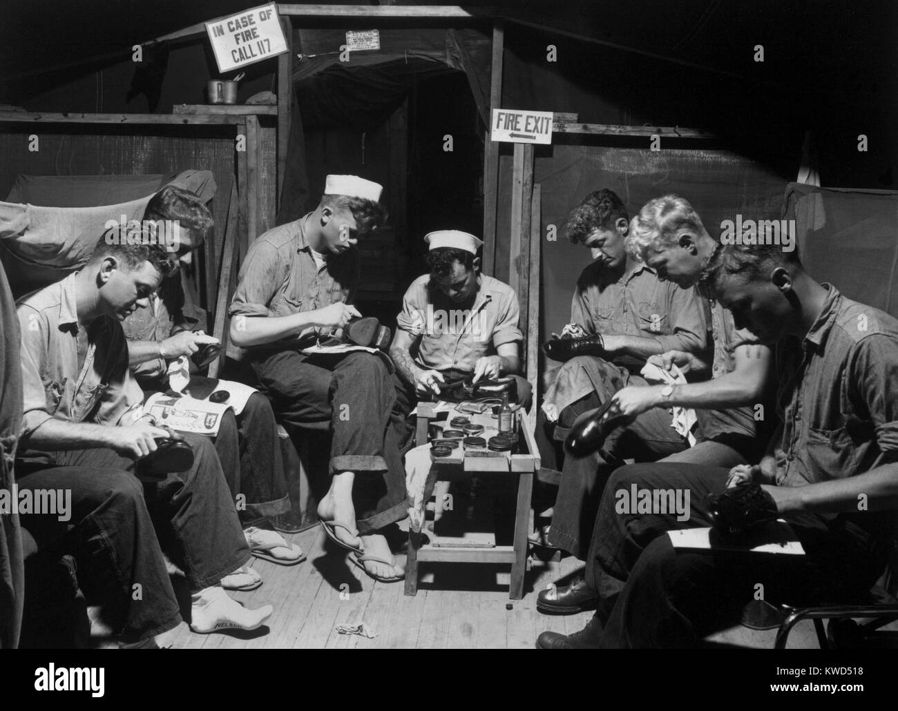 U.S. sailors shining shoes prior to acting as honor guard at Panmunjom ...