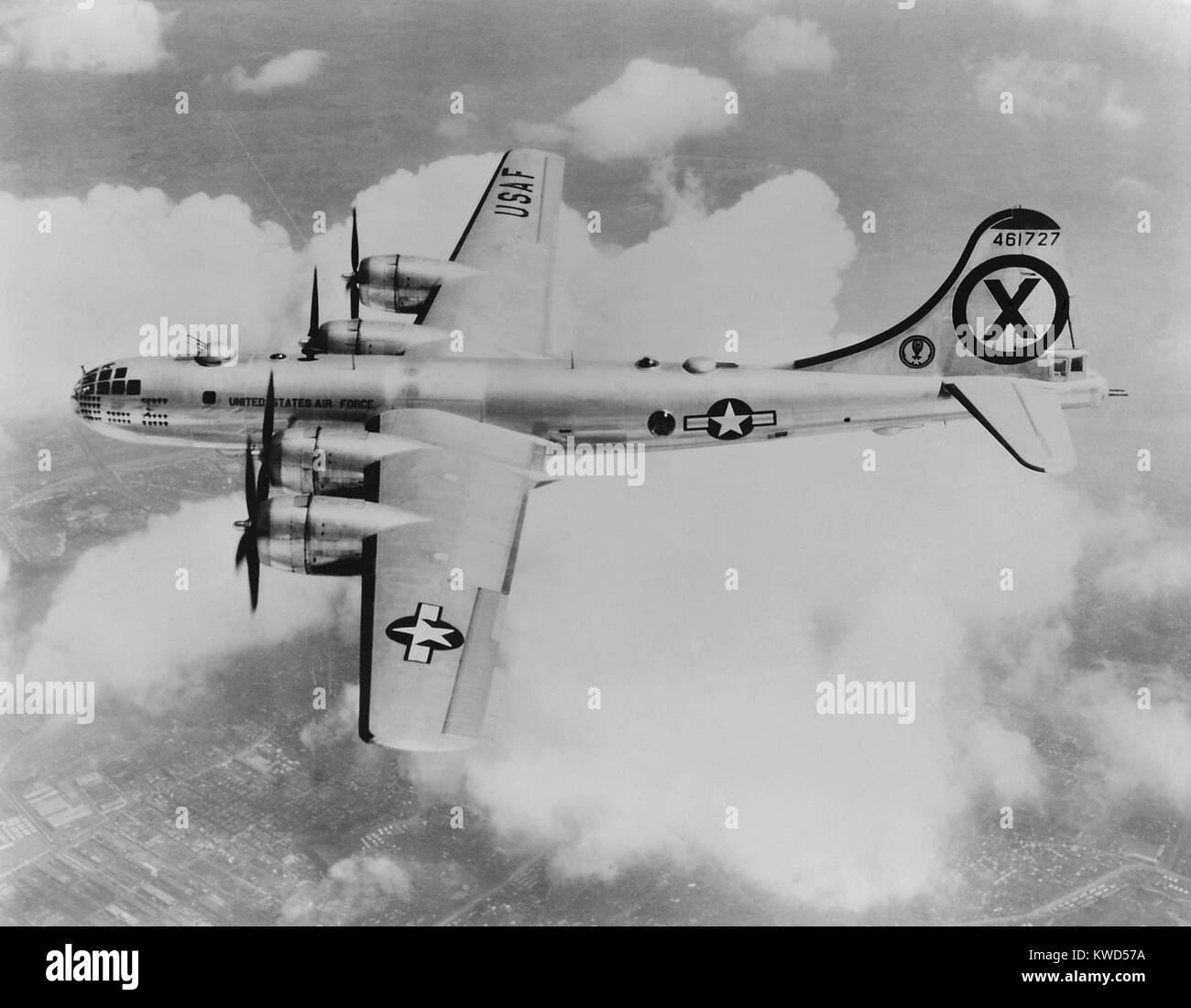 RB-29 of the 31st Reconnaissance Squadron, somewhere over Korea. The reconnaissance version of the Superfortress bomber performed target and bomb-damage assessment photography. They also conducted electronic reconnaissance of enemy ground radar. Their daylight missions were dangerous as they were vulnerable the MiG jet fighters. Korean War, 1950-53. (BSLOC 2014 11 219) Stock Photo