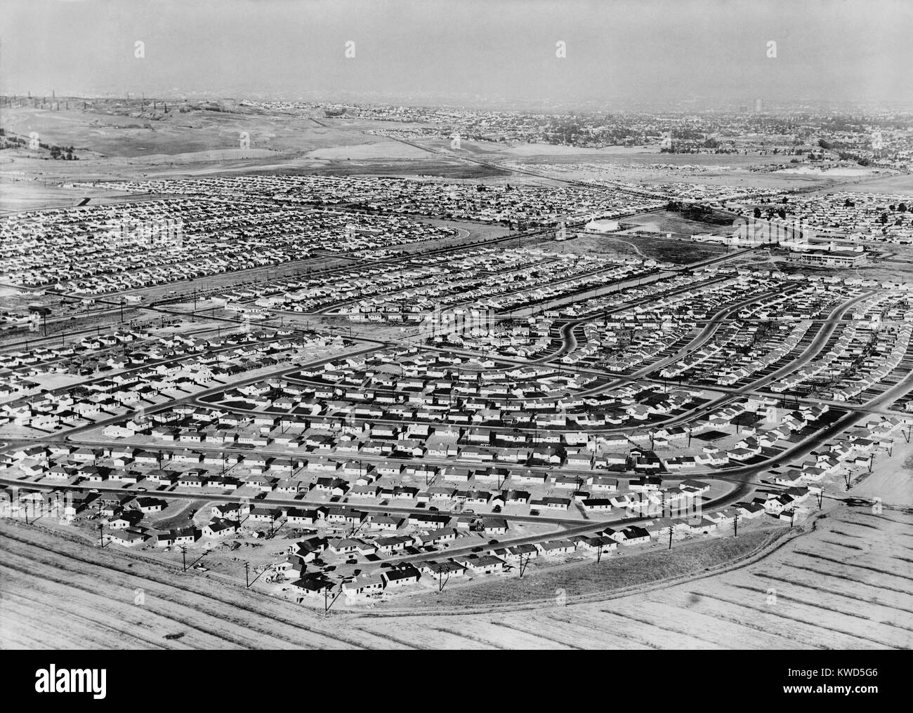 Aerial view of suburban housing developments sprawling from Los Angeles. 1954. (BSLOC_2014_13_147) Stock Photo