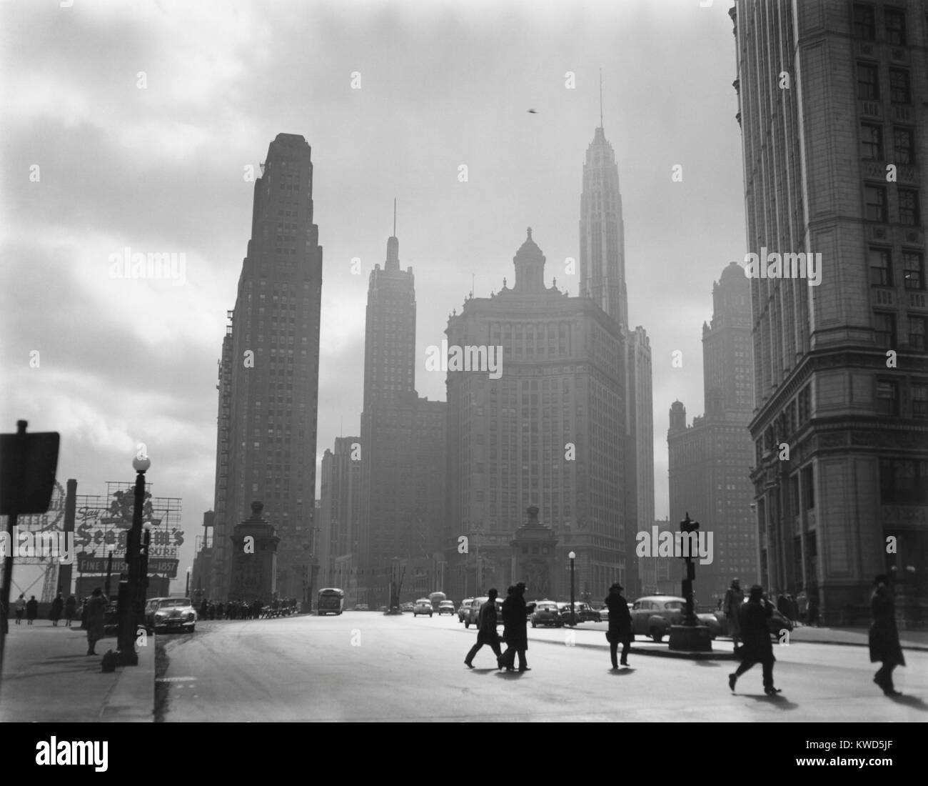 Mid-century Chicago, looking down Michigan Avenue, 1951. Buildings shown are (L-R) #333 No. Michigan Avenue; Carbon and Carbide Building; London Guarantee & Accident Building, Lincoln Tower; Pure Oil; and Wrigley Building. By Oliver E. Pfieffer, March 1951. (BSLOC 2014 13 194) Stock Photo