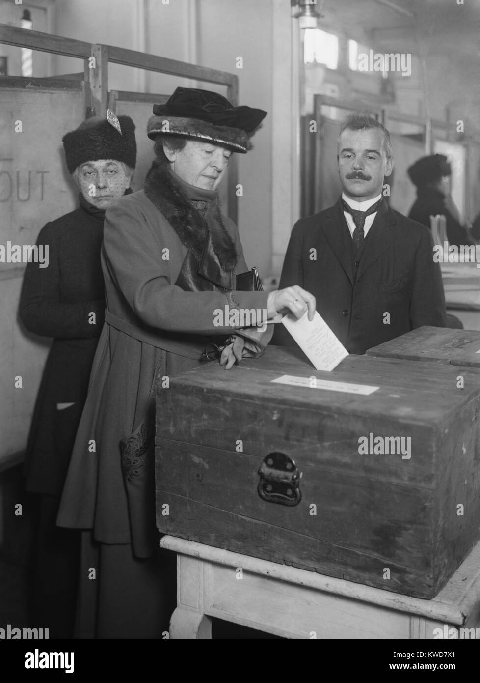American woman votes, ca. 1920. The 1920 election was the first time all American female citizens over 21 were able to vote for a U.S. President. (BSLOC 2015 16 189) Stock Photo